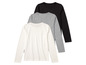 Drie effen, langarmige t-shirts in wit, grijs en zwart.