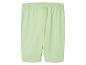 Lichtgroene sport shorts.