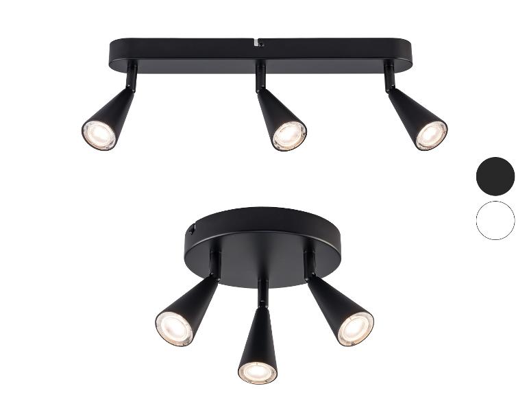 Twee zwarte plafondspots met LED-lampen, één lineaire met drie en één ronde met vier.