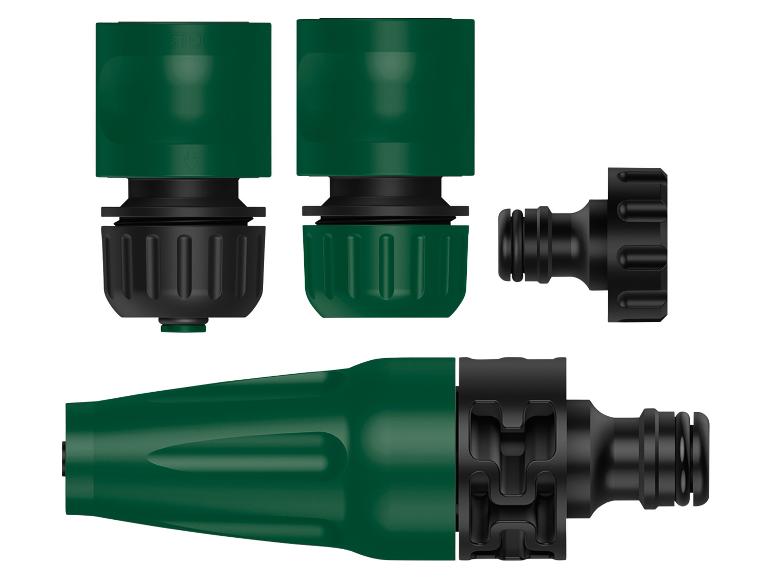 Groene en zwarte tuinslangkoppelingen en spuitmond.