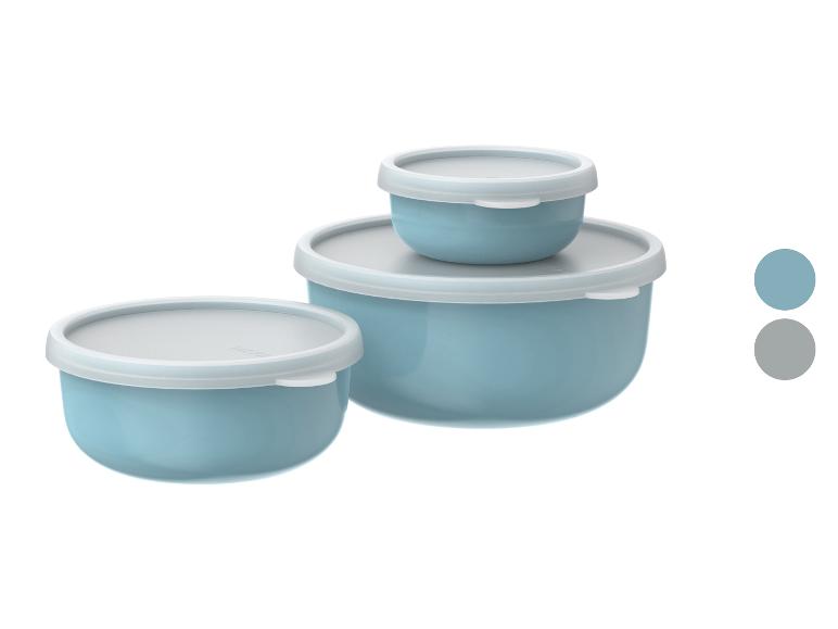 Set van drie ronde blauwe opbergkommen met witte deksels.