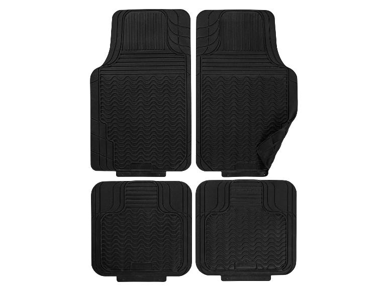 Set van vier zwarte automatten met golf- en geribbelde texturen.