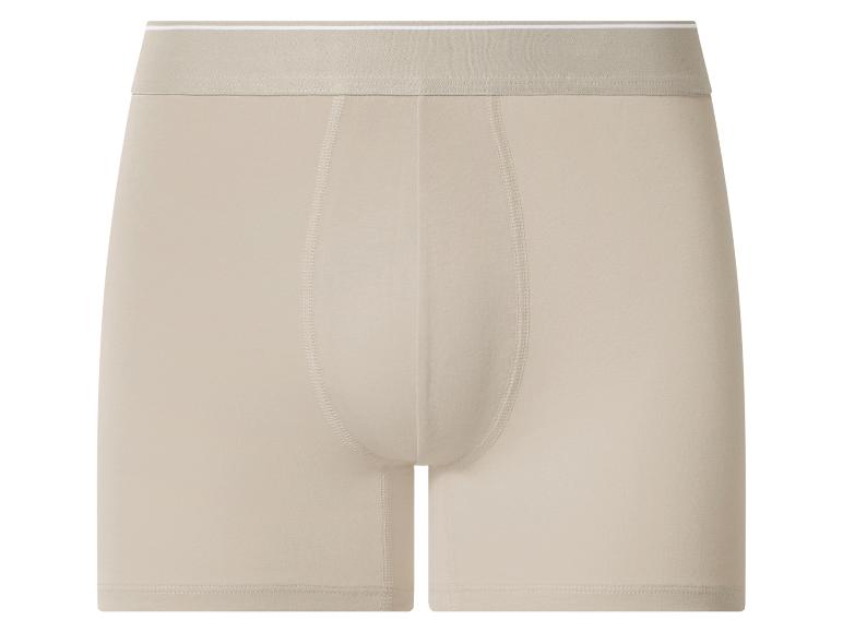 Beige herenboxershort met elastische tailleband.