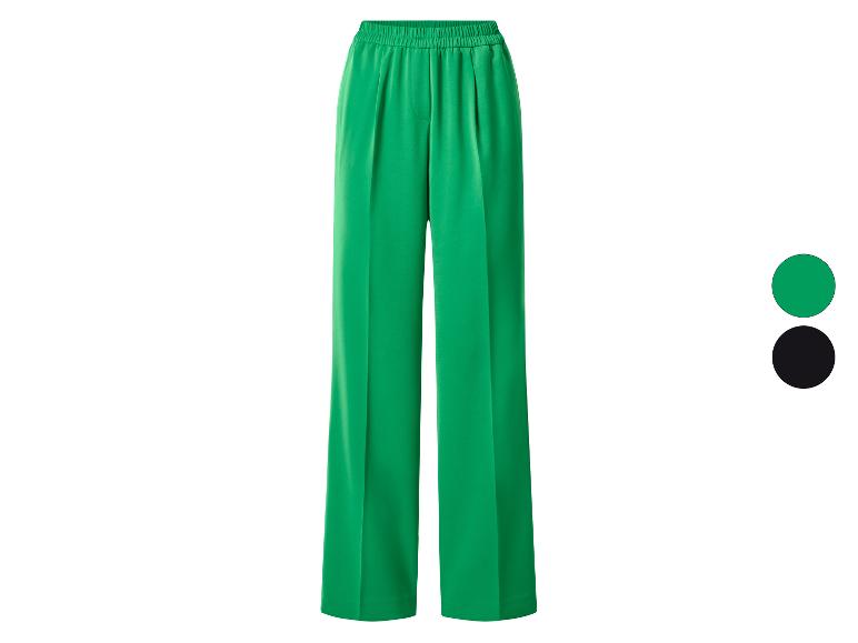 Groene wijde broek met elastische tailleband, ook verkrijgbaar in zwart.
