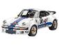 Witte Porsche 911 Martini Racing modelauto met blauwe en rode strepen.