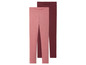 Twee paar leggings in roze en donkerrood.