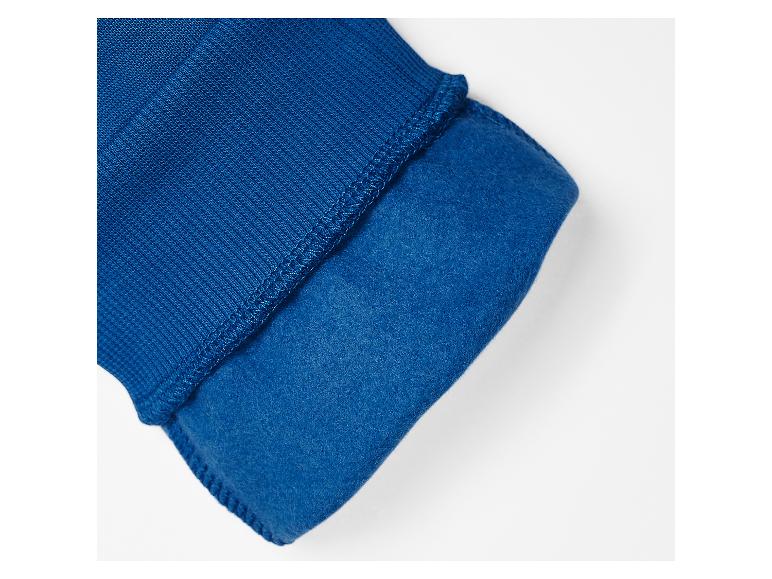 Blauwe geribbelde stoffen manchet met fleece voering.