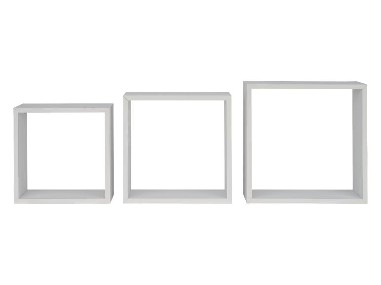 Drie witte vierkante wandplanken in verschillende maten