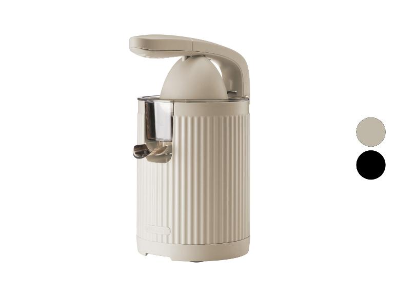 SilverCrest elektrische citruspers in beige met zwarte accenten.