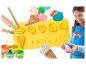 Play-Doh set met deegrollers, mallen voor ijs, gezichten en vormen, en kleurrijke Play-Doh potjes.