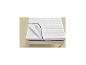 LIVARNO HOME matrastopper met ritssluiting op een houten bed.