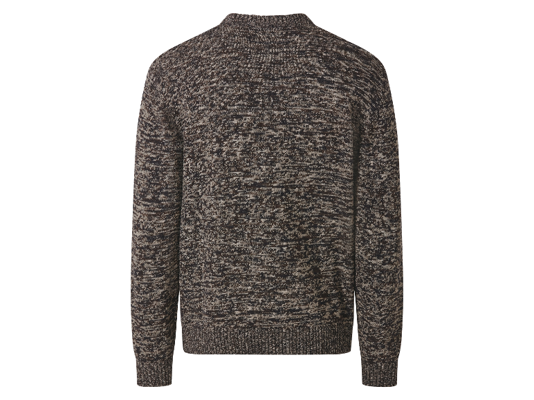 Een donkerbruine gebreide trui met patroon.
