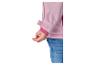 Mouw van roze softshelljack met klittenbandsluiting en elastische manchet, gedragen met jeans.