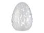 Een witte glazen lamp in de vorm van een ei.