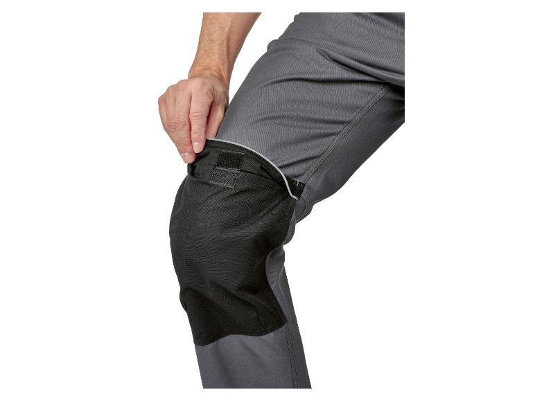 Werkbrouwers met kniebeschermers.