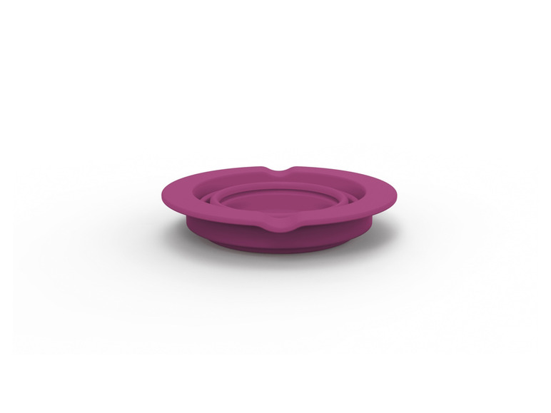 Een roze set met in elkaar passende kommen.