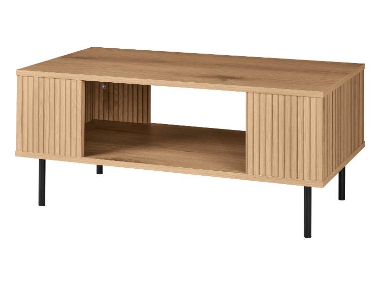 Houten salontafel met geribbelde deuren en zwarte poten.