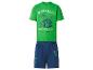 Groen T-shirt en donkerblauwe shorts met avontuur- en mijnbouwthema-prints