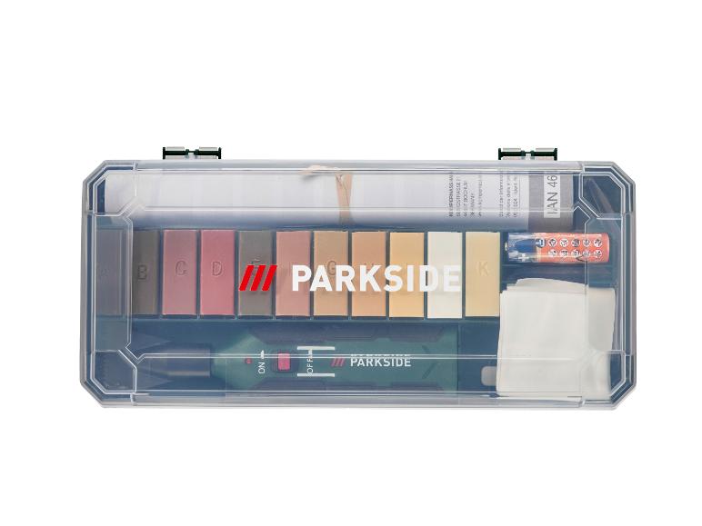 PARKSIDE reparatieset met wasstiften, smeltgereedschap en accessoires in een transparante doos.