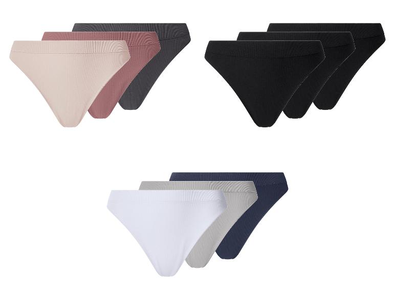 Sets van drie damesonderbroeken in diverse kleuren: beige, zwart en wit.