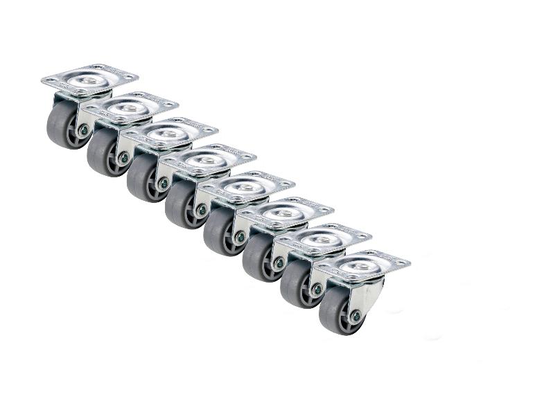 Zeven zilveren meubelwielen met grijze wielen.