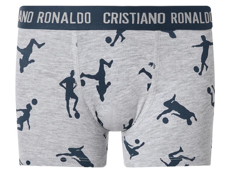Grijze boxershort met voetbalsilhouetten en tailleband met tekst.