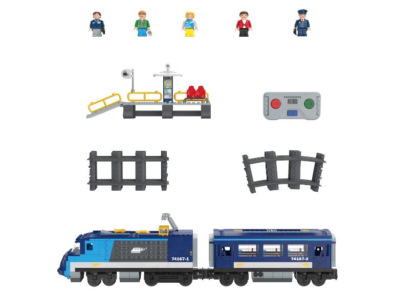Speelgoedtreinset met locomotief, passagierswagon, rails, station, afstandsbediening en vijf minifiguren.