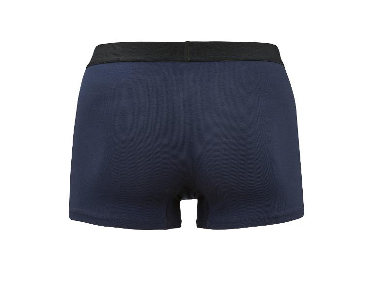 Donkerblauwe boxershort met zwarte elastische tailleband, achteraanzicht