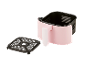 Een roze airfryer met een uitneembaar mandje.