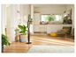 Een stoomreiniger van Karcher in een moderne keuken met houten vloer.