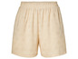 Beige shorts met een gedetailleerd bloemenpatroon.