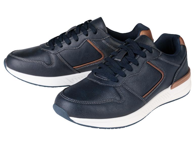 Donkerblauwe sneakers voor heren met witte zool.