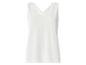 Witte damestop met V-hals en kanten afwerking.