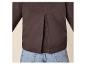 Donkerbruine blouse met plooi op de rug, gedragen met jeans.