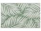 Groen tapijt met palmbladpatroon