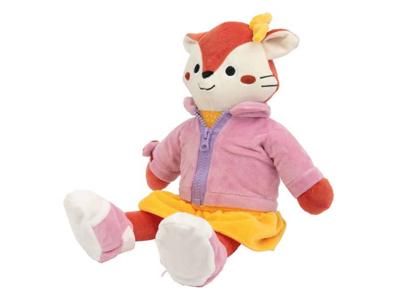 Pluche vos in een roze jas en gele rok.