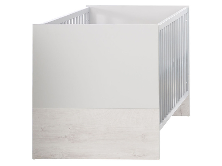 Wit babybed met houten details