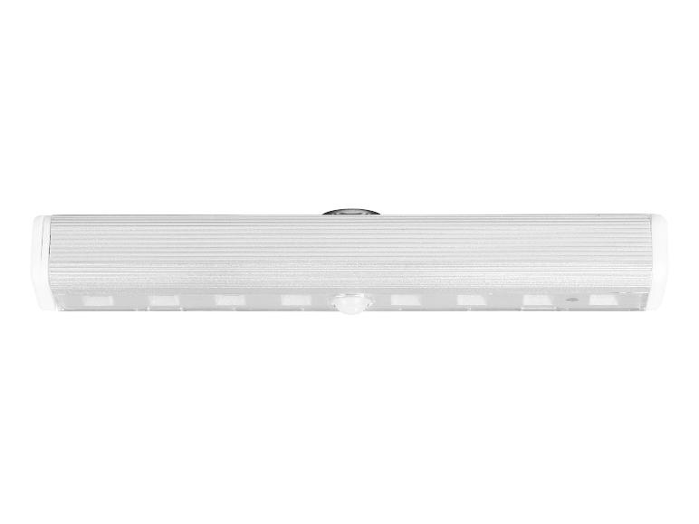 LED-bewegingssensorlamp, met een zilveren behuizing en witte uiteinden.