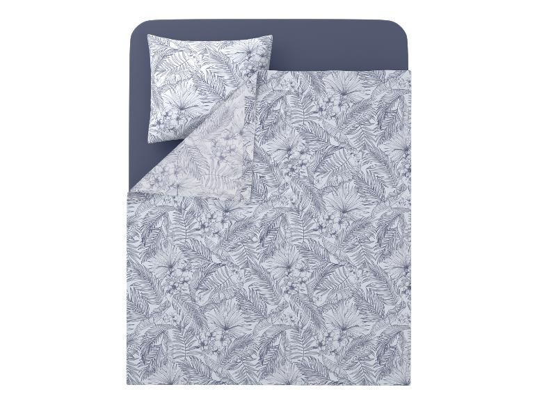 Dekbedovertrekset met tropisch blad- en bloemenpatroon, blauw en wit.