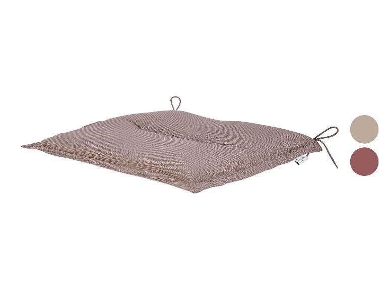 Bruin zitkussen met strikjes en twee kleurstalen