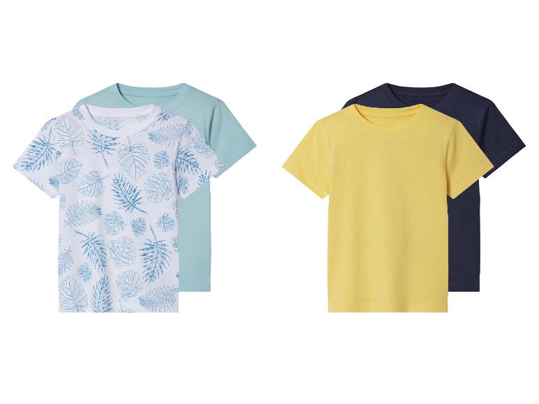 Pakket T-shirts: tropische print en effen kleuren, geel en donkerblauw.