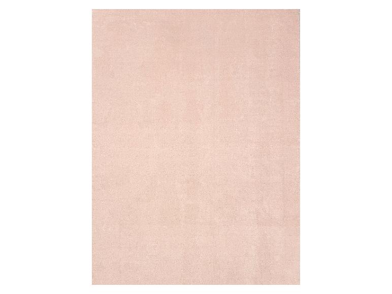 Lichtroze rechthoekig vloerkleed met een subtiele textuur.