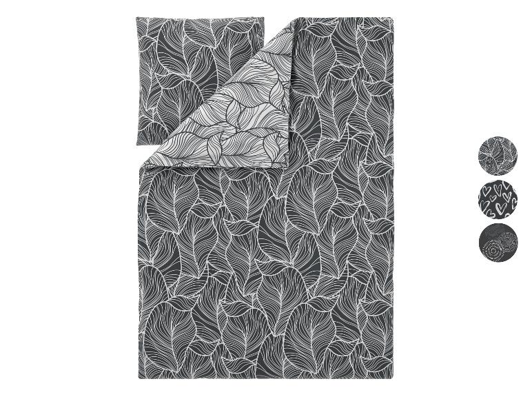 Dekbedovertrekset met grijs en wit bladmotief, met extra ontwerpen.