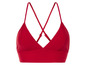 Een rood bikini-topje met dunne bandjes.