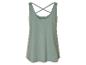 Sagegroene tanktop met gekruiste bandjes.