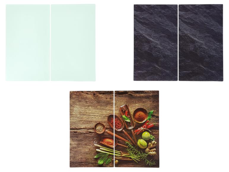 Glazen snijplanken met kruiden-, lichtgroene en donkere leisteenontwerpen.