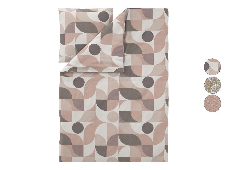 Dekbedovertrek en kussensloop set met geometrisch patroon in roze en grijstinten.