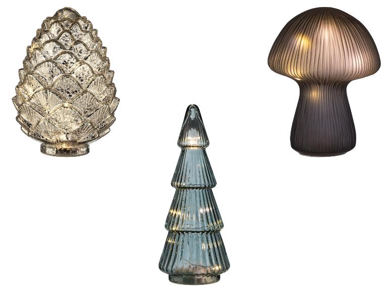 Drie decoratieve glazen lampen: een dennenappel, een kerstboom en een paddenstoel.