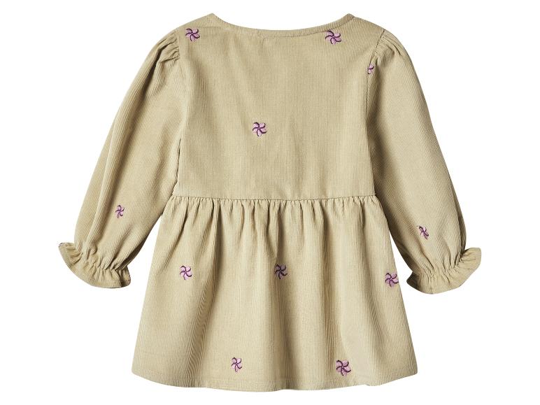 Kinderjurk van beige ribfluweel met paars bloemenborduurwerk