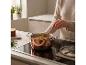 SILVERCREST® Premium pan met koperlaag kookt op inductiekookplaat.